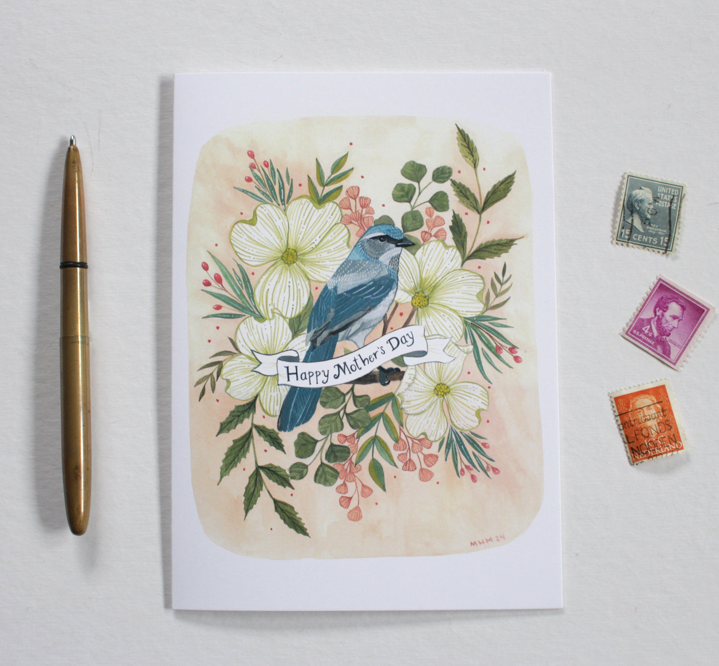Mother’s Day card with a blue bird and floral design,