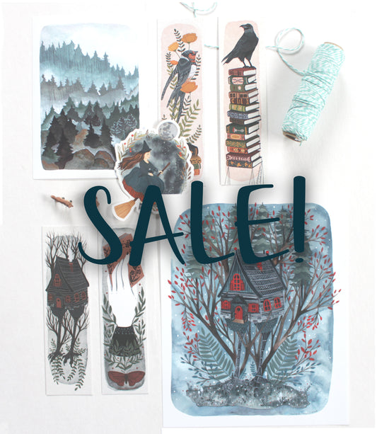 a collage of some of my products including bookmarks, a Baba Yaga print, a print of a misty forest and a sticker with a witch flying on a broom