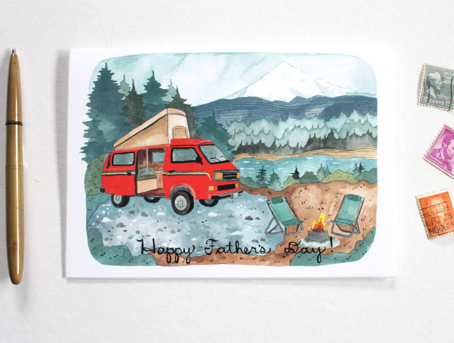 Card with a red camper van in a scenic setting, featuring 'Happy Father's Day!' text.