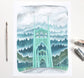 Watercolor painting of the St Johns Bridge with trees and clouds on a white background